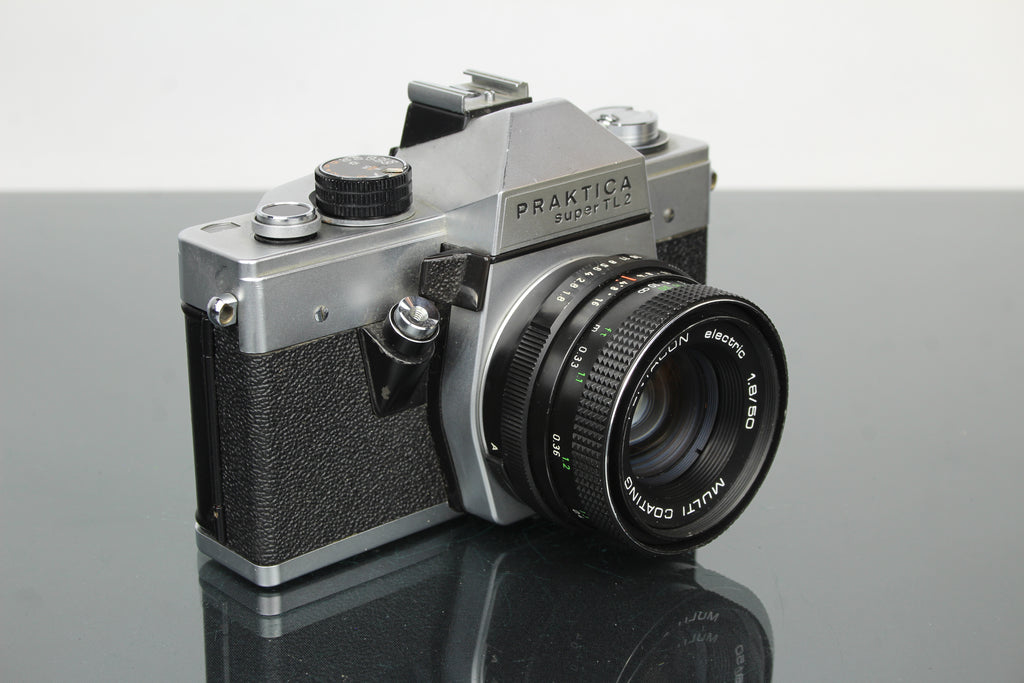 <tc>Praktica</tc> super TL2 + objectif Pentacon électrique 50mm 1.8 M42