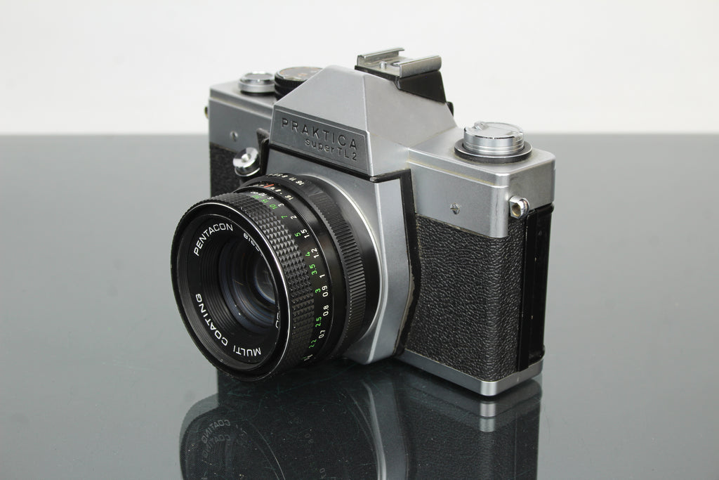 <tc>Praktica</tc> super TL2 + objectif Pentacon électrique 50mm 1.8 M42