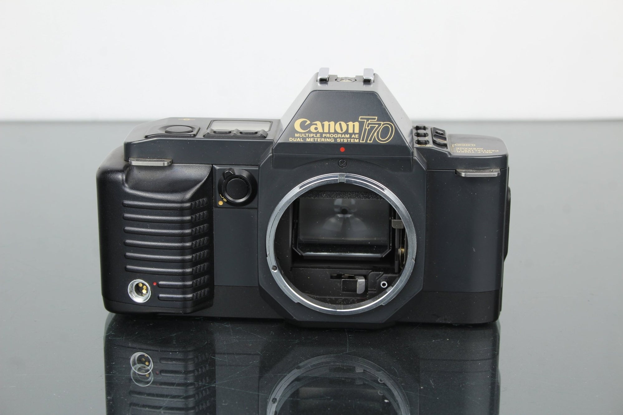 Canon T70 - Dutch|Thrift