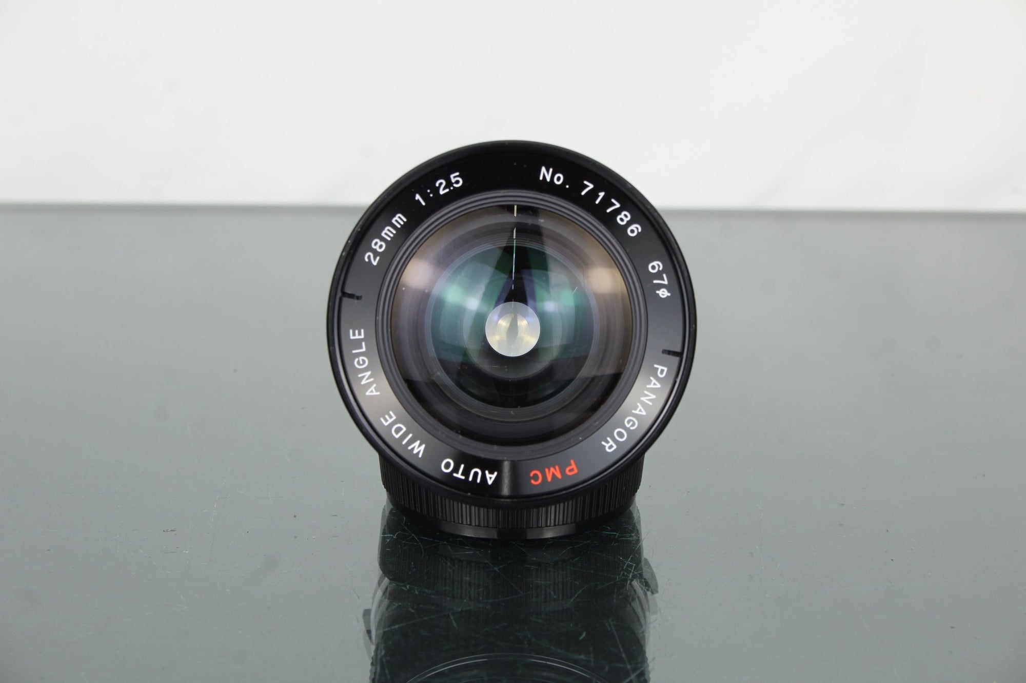 Panagor 28mm 1:2.5 OM mount - Dutch|Thrift